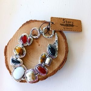 Silver with multicolored stones throughout